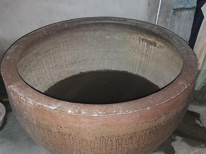 现在就算是农村也找不到几口这种老物件,酿酒神器